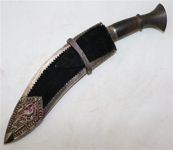 A kukri with silver mounted scabbard, overall 14in.